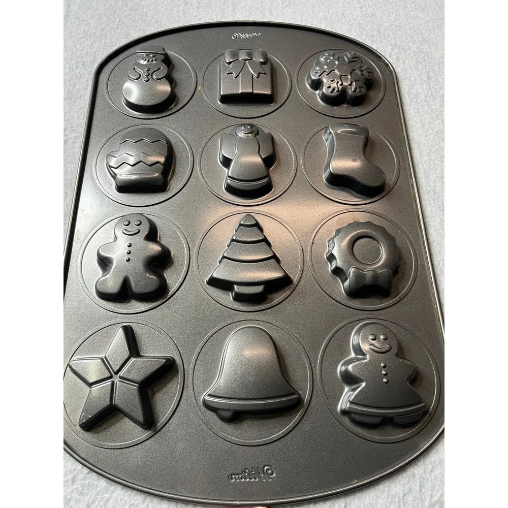 Wilton 12 Cup Christmas Holiday Baking Pan Gingerbread Snowman Tree Bell‎ Star